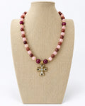 Rosé Pearl Cross Necklace